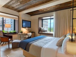Eco-luxury king room at 1 Hotel Central Park in New York City with natural materials, plush bedding and Central Park-inspired interiors